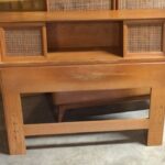 twin headboard with cane doors.
