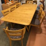 197 Triple pedestal table fully opened with both extension leaves with 6+2 Dogbones. Previously refinished by another dealer in an acceptable Wheat.