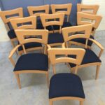 Set of 8 side and two captains chairs redone Champagne and new upholstery.