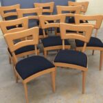 Set of 8 side and two captains chairs redone Champagne and new upholstery.