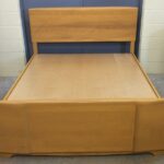 This bed has a Riviera base. custom Rio Queen platform bed