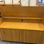 Lid opens for access to the turn table. hold pic 4