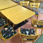 Table has two extension boards. Total length is 94 x 40 wide. 197 Triple ped table and 4 + 2 dogbones redone Wheat with brand new upholstery