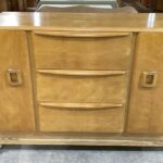previously refinished "Natural". The wood was not sanded down to fresh wood so some of the old color and patina remains.