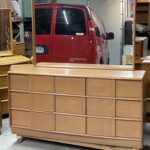 Triple dresser in original Champagne w/mirror. $1400