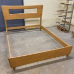 Customer has metal frame for inside, the bed will "float" around the box spring and mattress