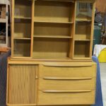 previously refinished in Wheat. Middle shelves are adjustable. Side shelves are fixed.