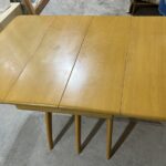 table shows a lot of use. The extension leaves are still very good. $1750