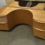 I was told the top left drawer was left uncolored to not obscure the wood figuring. Whatever.... $850