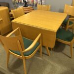 All was refinished Wheat several years ago. Chairs have original vinyl upholstery.