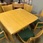 $1750 for the table and chairs. One arm chair has noticeable wear on the arms. The other chairs are very good.